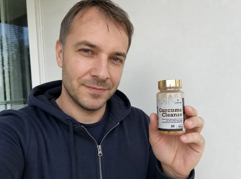 Man age 38 selfie holding supplement bottle