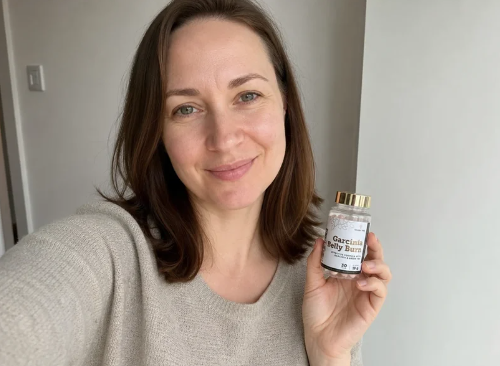 Woman selfie holding Garcinia Belly Burn