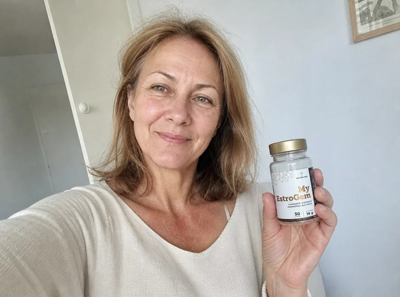 Woman selfie holding supplement product